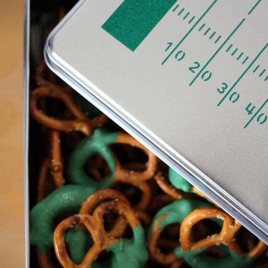 DIY Big Game Project Idea: How to Apply Glitter Adhesive Vinyl on an Aluminum Pretzel Tin